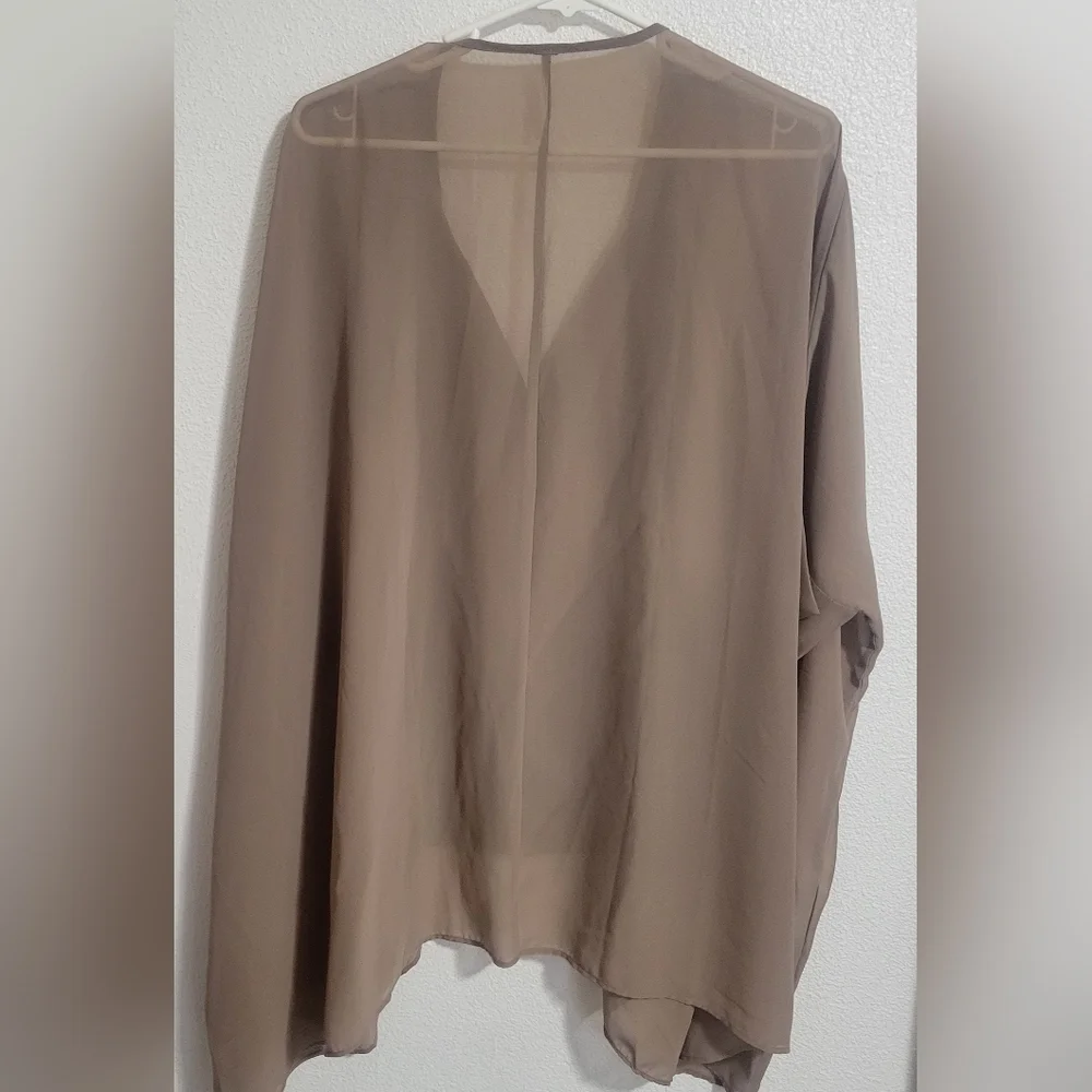 Free People embroidered oversized with tassel details boho style top size small